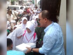 Sosialisasikan Program Pasangan Prabowo-Gibran, Pengurus Partai Gerindra Kabupaten Bekasi Bagikan Makan Siang Gratis